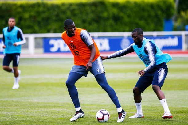 Tanguy Ndombele e Paul Pogba of France durante treino da França.
